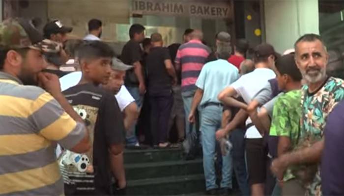 long ques outside bakery in lebanon