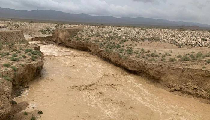 dams washes away in flood