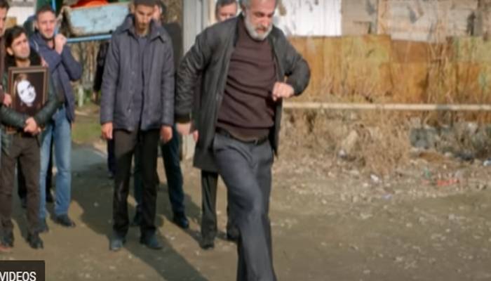 IRANIAN FATHER DANCES ON DAUGHTER GRAVE