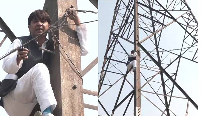 hasebul hassan climbs transmission tower