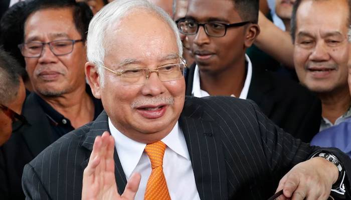 Malaysia halves jail term and cuts fine for corrupt ex-PM Najib Razak over 1MDB fund scandal